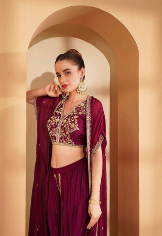 Elegant wine crepe blouse and cape with intricate pearl & mirror detailing, tulip pants.