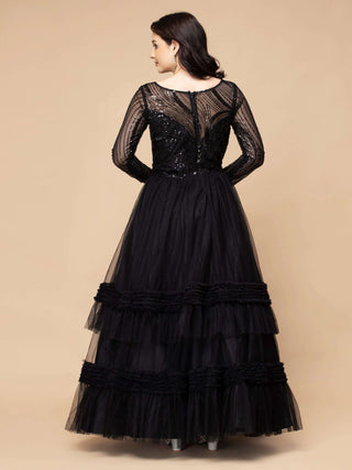 Black net gown with layered ruffles and bead embroidered yoke