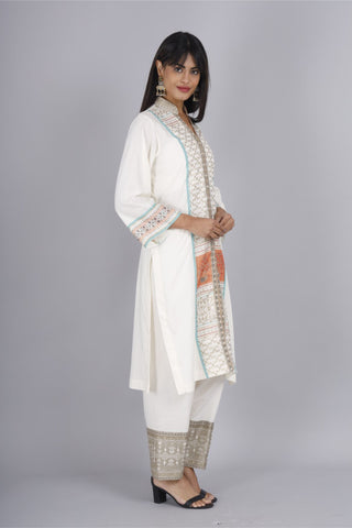Block printed off-white kurti paired with cotton rayon hem pants.