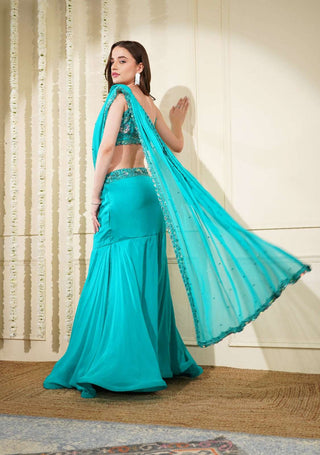 Elegant Fish Cut Skirt with Embroidered Border Pallu & Full Embroidered Noodle Strap Blouse

