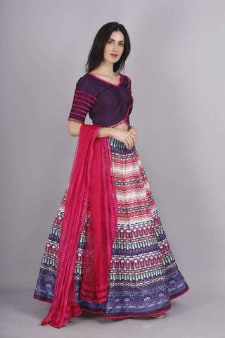 Elegant purple-pink skirt with crop top and hot pink organza dupatta.