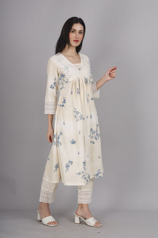 Elegant off-white and cream suit with Kroshia lace accents.