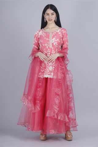 Elegant pink organza sharara set with embroidered round neck kurti.