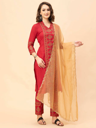 Maroon cotton rayon kurti with block print pants and golden dupatta.