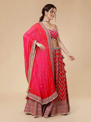 Milu Madan red and hot pink lehenga with mirror motif dupatta
