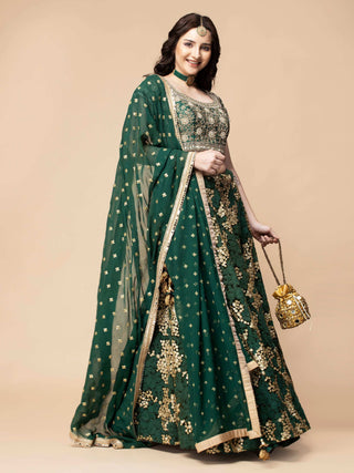 Milu Madan signature bottle green lehenga with embroidered silk blouse