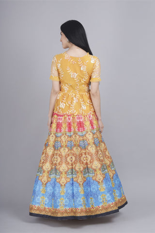 Multi-colored peplum co-ord set with printed skirt and net top.
