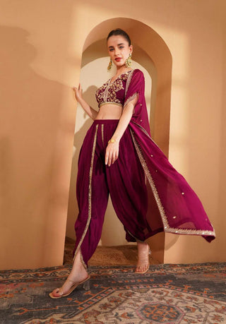 Wine crepe blouse and cape with pearl & mirror accents, matching mirror border tulip pants.
