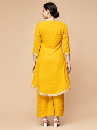 Chikan work mustard yellow kurti and plazzo with back trail.