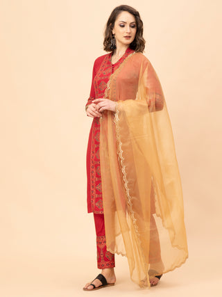 Elegant maroon suit set with block print kurti and bordered pants.