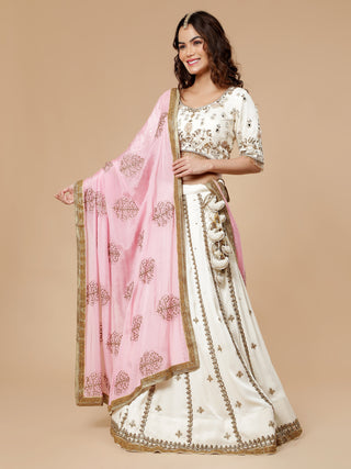 Elegant off white lehenga with antique dabka work and 3D blouse