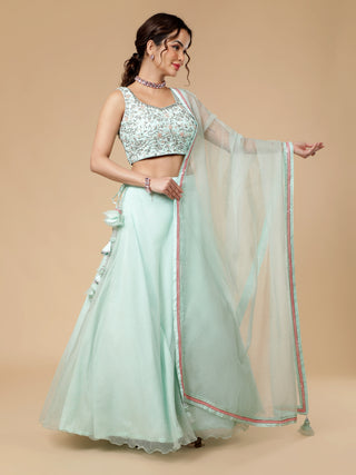 Elegant sea foam green lehenga with bead embroidery and floral dupatta