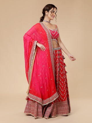 Milu Madan red and hot pink lehenga with mirror motif dupatta
