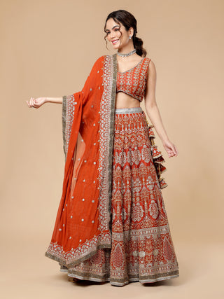Milu Madan rusty lehenga with zari, cut dana, and bordered dupatta