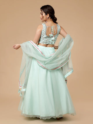 Milu Madan sea foam green lehenga with floral embossed organza details