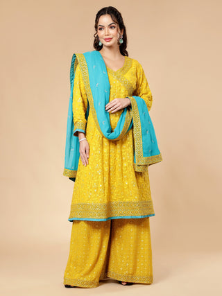Mustard yellow sharara set with georgette angrakha and turquoise border dupatta