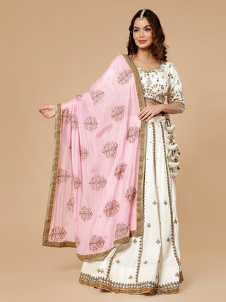 Off white satin lehenga with antique cut dana and 3D pearl work