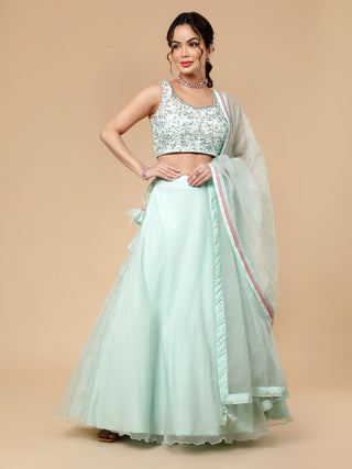 Sea foam green lehenga with sequin blouse and floral organza dupatta