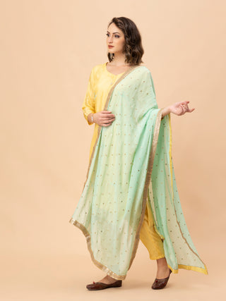 Silk lemon yellow kurti with gota patti and sequin dupatta.