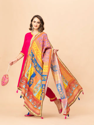 Vibrant hot pink suit set with gota work and chinon dupatta.