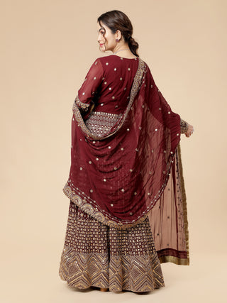 Wine Anarkali with running zari, sequin embroidery, and brocade pant.
